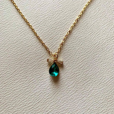 collier doré pendentif zircon bleu