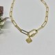 collier doré maille trombone mousqueton
