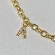 collier doré pendentif zircon bleu
