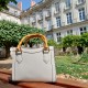 white round rattan bag
