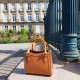 white round rattan bag
