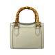 white round rattan bag