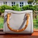 white round rattan bag
