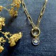 collier doré maille trombone  oeil bleu